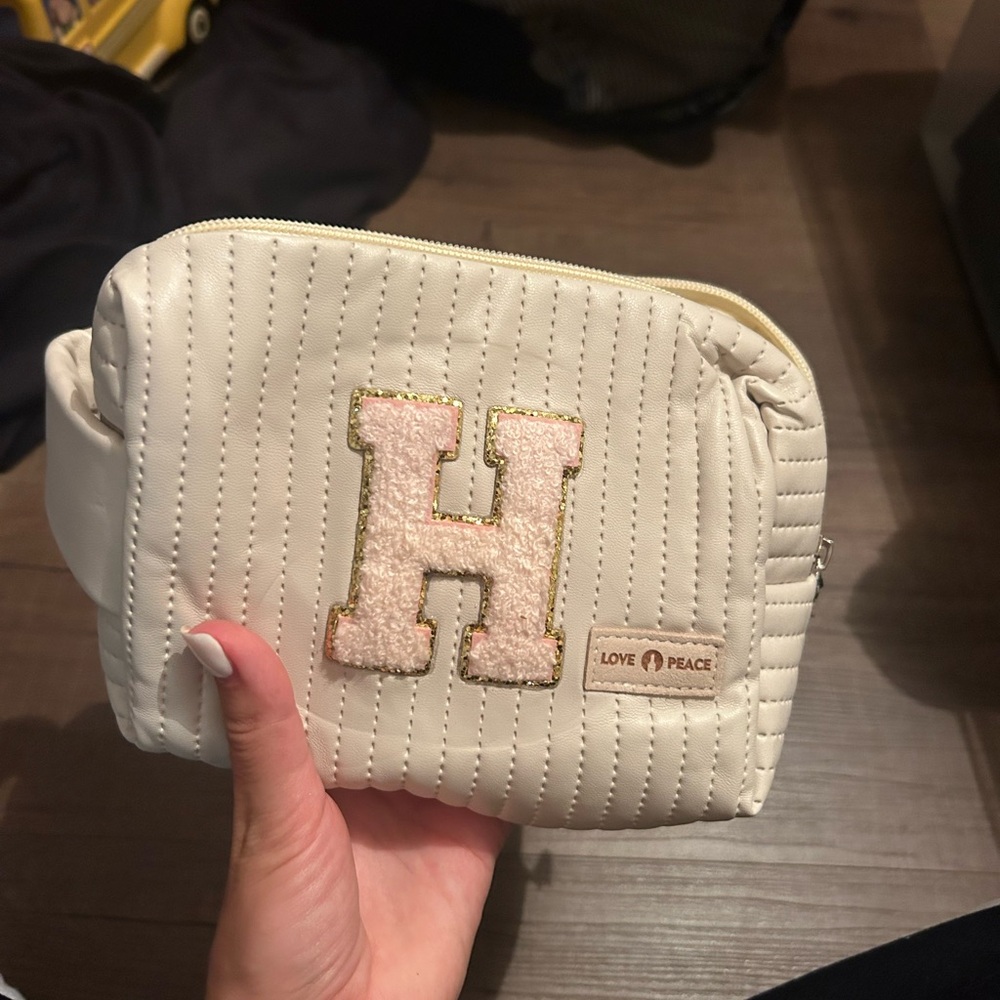 H makeup bag